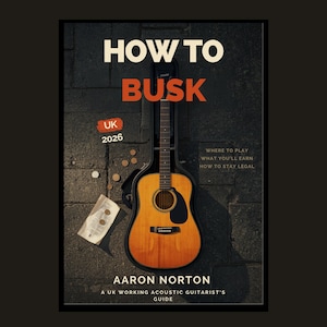 May include: Acoustic guitar in a black case, leaning against a dark brick wall. The book cover reads "HOW TO BUSK" in white and orange text. Additional text includes "UK 2026" and "AARON NORTON".