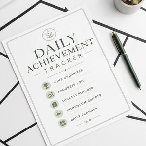 May include: A white paper sheet titled Daily Achievement Tracker in dark green text, featuring five circular icons with labels: Wins Organizer, Progress Log, Success Planner, Momentum Builder, and Daily Planner, accompanied by a dark green pen.