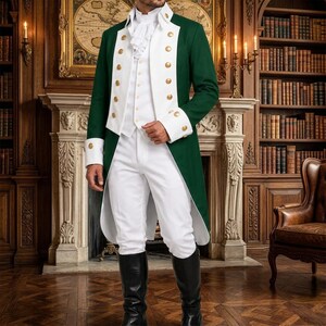 May include: A dark green tailcoat with white lapels and gold buttons, worn over a white waistcoat with a ruffled cravat and white trousers. The ensemble is completed with black knee-high boots, creating a formal historical-style outfit.