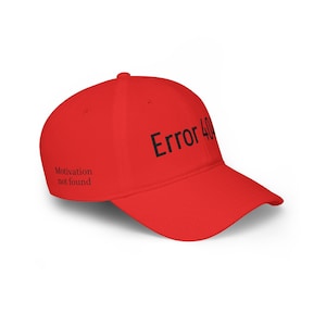 May include: A bright red baseball cap featuring the black text Error 404 printed on the front panel and the black text Motivation not found printed on the side panel. The cap has a curved brim and a structured crown with a button on the top.