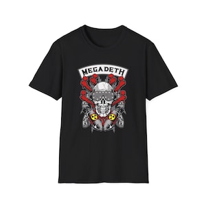 May include: A black short-sleeve t-shirt featuring a graphic print of a skull wearing studded goggles. The design includes the text MEGADETH, red bone-like shapes, chains, and two bombs marked with yellow and black radioactive warning symbols.