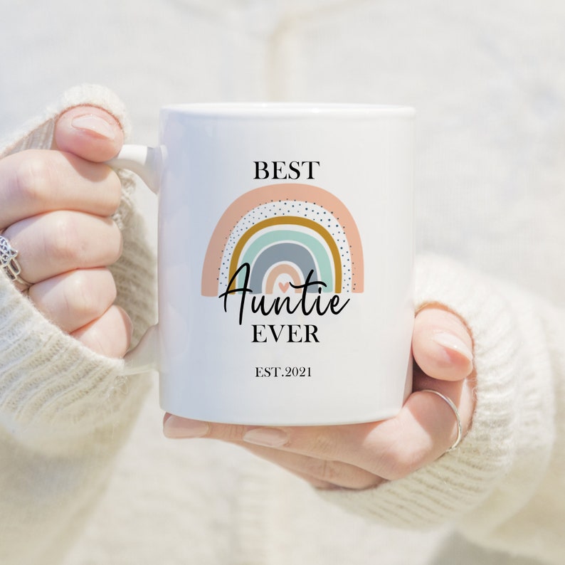 a Handmade Ceramic rainbow pattern personalized mug which is dishwasher safe and long lasting is the best gift for your aunt