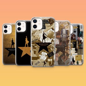 May include: A collection of five phone cases featuring designs inspired by the musical "Hamilton." The cases display images of stars, silhouettes, and text from the musical. The color palette includes gold, black, and sepia tones.