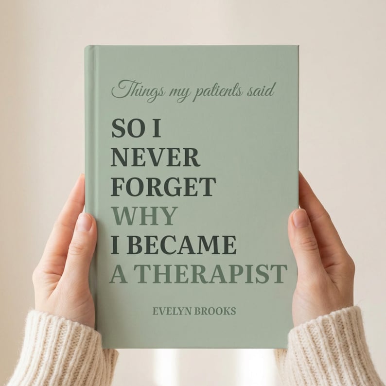 May include: A sage green hardcover journal with the title Things my patients said SO I NEVER FORGET WHY I BECAME A THERAPIST printed in dark green and sage green text, with the author name Evelyn Brooks at the bottom of the front cover.