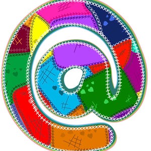 May include: An at symbol graphic composed of various colorful fabric patches in shades of red, orange, yellow, green, blue, purple, and pink, all joined together by visible white cross-stitch detailing along the edges of each individual section.
