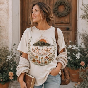 Be Still and Know Shirt, Christian T-Shirt Women, Mountain Floral Tee, Psalm 46:10 Scripture Shirt, Faith Shirt, Religious Gift for Her
