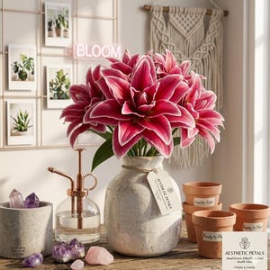 May include: A bouquet of vibrant red and white lilies in a textured, off-white vase. The arrangement is on a wooden surface, with a copper-toned mister, crystals, and small terracotta pots. The word "BLOOM" is in neon lights.