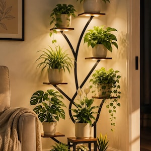 May include: A tall, black metal plant stand with a branching design featuring multiple wooden shelves. Each shelf holds a potted plant, and integrated warm LED lights illuminate the foliage from below, creating a glowing display of greenery.