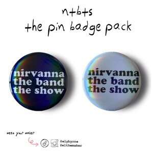 May include: Two circular pin badges, one dark with rainbow iridescence, the other white. Both feature the text "nirvanna the band the show" in white. The text "n+bts the pin badge pack" is above the badges.