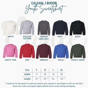 May include: A selection of Gildan 18000B youth sweatshirts in various colors, including white, gray, navy, and black. The image also displays pink, red, maroon, royal blue, and forest green sweatshirts. A size chart is included.
