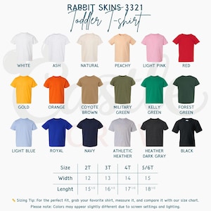 May include: A product display of Rabbit Skins 3321 toddler t-shirts in various colors, including white, red, and navy. The image includes a size chart with measurements in inches for width and length, ranging from 12 to 15 inches wide and 15 1/2 to 18 1/2 inches long.