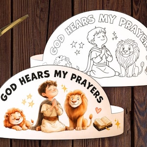 May include: Printable crown craft with the text "Daniel & the Lion's Den" and "God Hears My Prayers". The design includes illustrations of a boy, lions, and an open book. The text "Color, Wear & Learn the Scriptures" is also present.