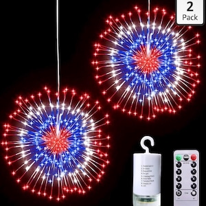 May include: Two hanging LED light displays in red, white, and blue, resembling fireworks. A remote control and a white control box with a hook are also visible. The lights are designed to create a festive atmosphere.