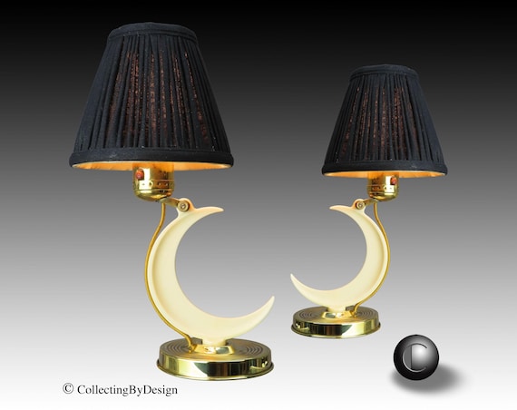 A Pair of Steel and Chrome Table Lamps by Chase A Pair of Steel and Chrome Table Lamps by Chase