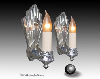 Par de apliques de pared Art Déco cromados "Sunburst" de Lapco, año 1930, restaurados.