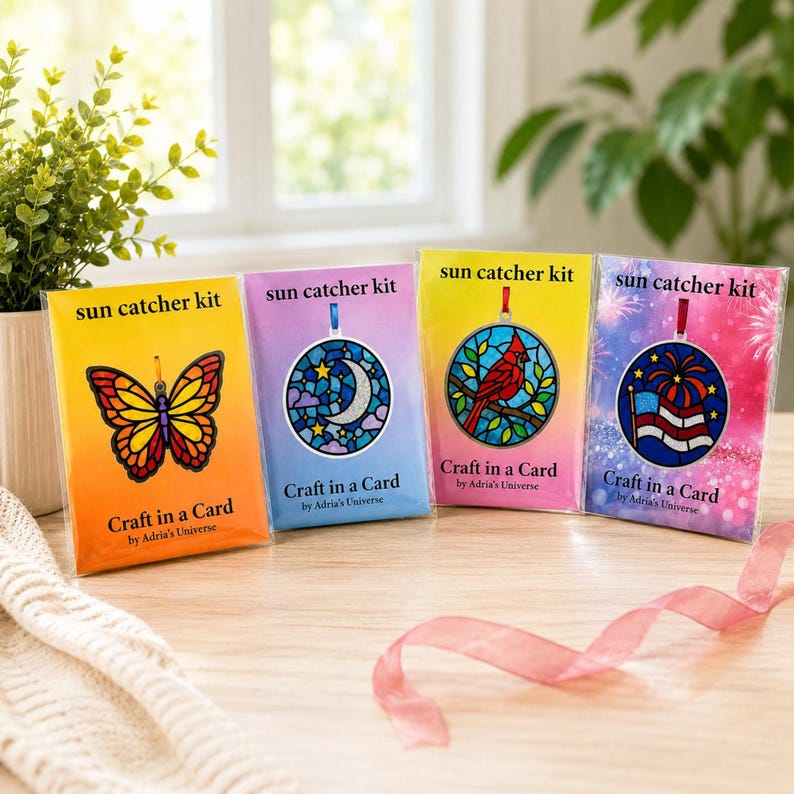 Four of the suncatcher kits on a table