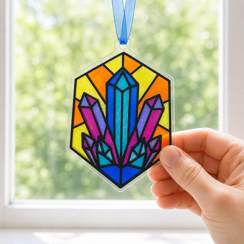 Suncatcher kit in a hand for scale