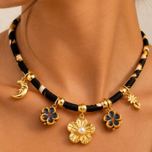 Gold-Tone Moon and Flower Charm Necklace on a Leopard-Print Cord image 4