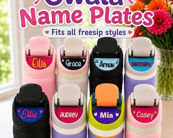 May include: A collection of eight colorful Owala water bottle name plates, each featuring a unique name including Eilis, Grace, Arnav, Kennedy, Ellie, Audrey, Mia, and Casey. The plates are attached to the lids of various water bottles.