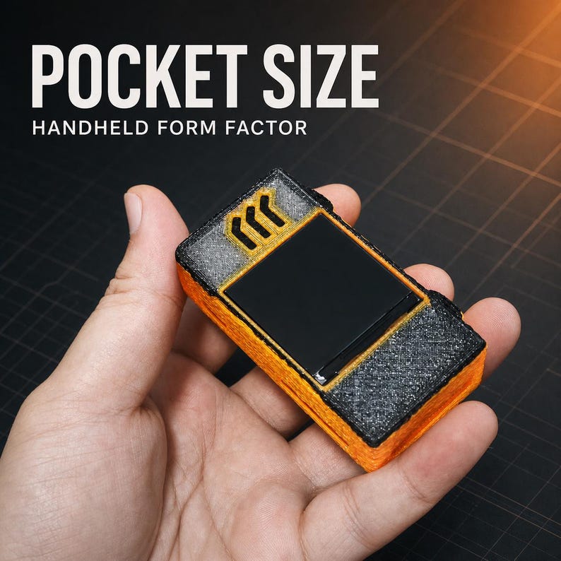 May include: A rectangular handheld device with a textured orange body and black accents. The top features a black screen area and a small yellow arrow icon. The text POCKET SIZE HANDHELD FORM FACTOR is displayed above the device in white.