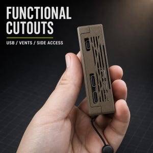 May include: A rectangular, matte brown electronic device case featuring functional cutouts for USB ports and ventilation vents. The text "FUNCTIONAL CUTOUTS" and "USB / VENTS / SIDE ACCESS" is printed in white and green above the device.