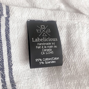 May include: Black and white care label with the text "Labelicious Handmade in/ Fait à la main au Canada CA 12345 95% Cotton/Coton 5% Spandex".
