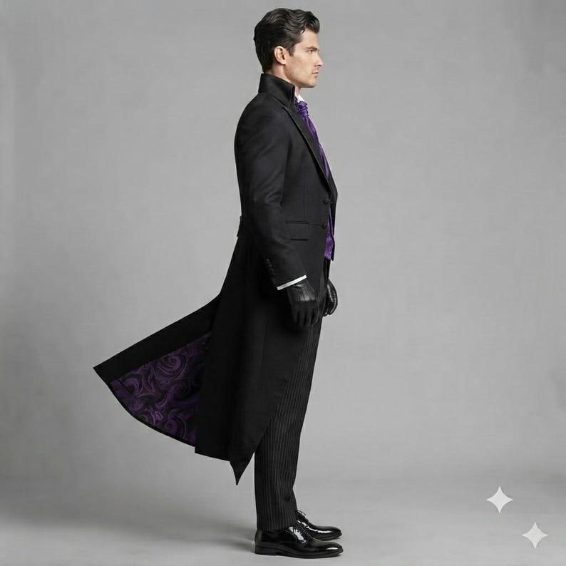 May include: A black tailcoat jacket with a high collar and a purple paisley lining, worn over a purple cravat and black pinstriped trousers. The ensemble includes black leather gloves and polished black dress shoes, creating a formal look.