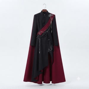 Women's Gothic Cape displayed on hanger, showing black structured coat, burgundy cape, high collar and decorative military-inspired details
