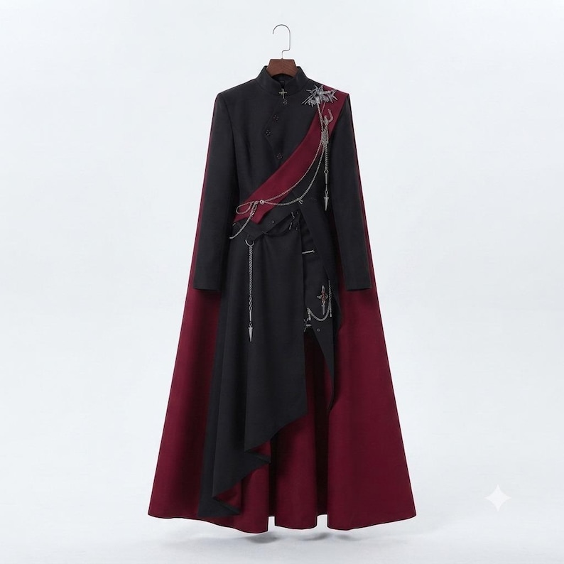 Women's Gothic Cape displayed on hanger, showing black structured coat, burgundy cape, high collar and decorative military-inspired details