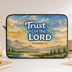May include: Laptop sleeve featuring a landscape painting with mountains, a river, and a starry sky. The text "Trust in the LORD" is prominently displayed, with "Proverbs 3:5" below. The sleeve has a black zipper and border.