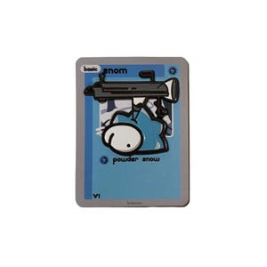 May include: A trading card featuring a cartoon character with a gun-like object. The card has a blue background with the words "powder snow" and "snom". The card is gray with the word "basic" at the top.
