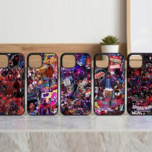 May include: Five phone cases with black frames and colorful Spider-Man graphics. The designs feature various Spider-Man characters and comic book elements in red, black, blue, and purple. Each case has a unique collage-style design.