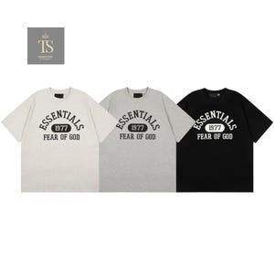 Maglietta unisex essenziale Fear of God 1977, maglietta streetwear di tendenza - vestibilità oversize casual immagine 1