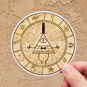 May include: A circular sticker featuring a tan, parchment-like background with a central black line drawing of a triangular, one-eyed character wearing a top hat and bow tie. The character is surrounded by a zodiac wheel containing ten distinct symbols.