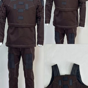 May include: A brown tactical uniform displayed on a mannequin. The outfit includes a long-sleeved top, pants, and a vest, all featuring black accents and white stitching. The uniform is designed with multiple rectangular patches.