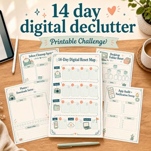May include: A 14-day digital declutter printable challenge set featuring a central 14-day digital reset map, inbox cleanup sprint, desktop folder reset, photos and downloads sorter, and an app audit and notification sweep sheet with teal text.