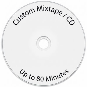 May include: A white circular compact disc with a central hole. The text "Custom Mixtape / CD" is printed in black along the top curve, and the text "Up to 80 Minutes" is printed in black along the bottom curve of the disc surface.