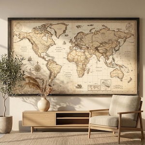 May include: A large, framed world map with a vintage aesthetic. The map features detailed illustrations of continents and oceans, with labels like "North Pacific Ocean" and "South Atlantic Ocean." The frame is dark, and the map is mounted above a wooden cabinet and chair.