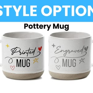 May include: Two white pottery mugs with a light brown base. One mug is labeled "Printed MUG" with a heart, star, and diamond design. The other mug is labeled "Engraved MUG" with a heart, star, and diamond design. The text "STYLE OPTION" is at the top.