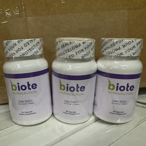 May include: Three white supplement bottles with purple and green labels. The labels read "biote NUTRACEUTICAL" and "DIM SGS+ Hormone + Detox". Each bottle has a white cap with a seal that reads "SEALED FOR YOUR PROTECTION".