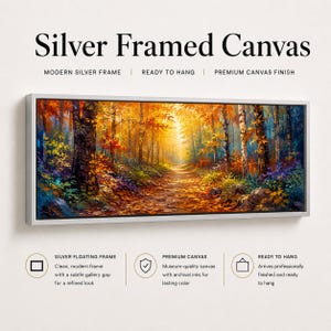 May include: A rectangular canvas print featuring an autumn forest path with vibrant orange, yellow, and red foliage, enclosed in a silver frame. The text reads Silver Framed Canvas, Modern Silver Frame, Ready to Hang, Premium Canvas Finish.