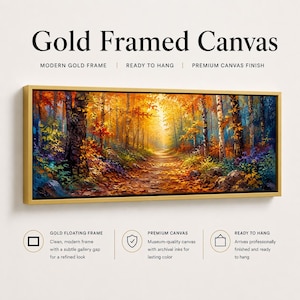May include: A rectangular canvas print featuring an autumn forest path with vibrant orange, yellow, and red foliage, enclosed in a gold frame. The text reads Gold Framed Canvas, Modern Gold Frame, Ready to Hang, Premium Canvas Finish.