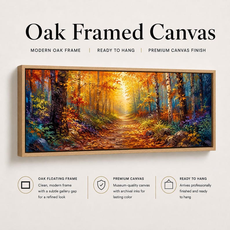 May include: A rectangular canvas print in a light oak wood frame featuring a forest path scene with vibrant autumn foliage in shades of orange, yellow, and deep blue. The text "Oak Framed Canvas" appears above, with additional descriptive text below.