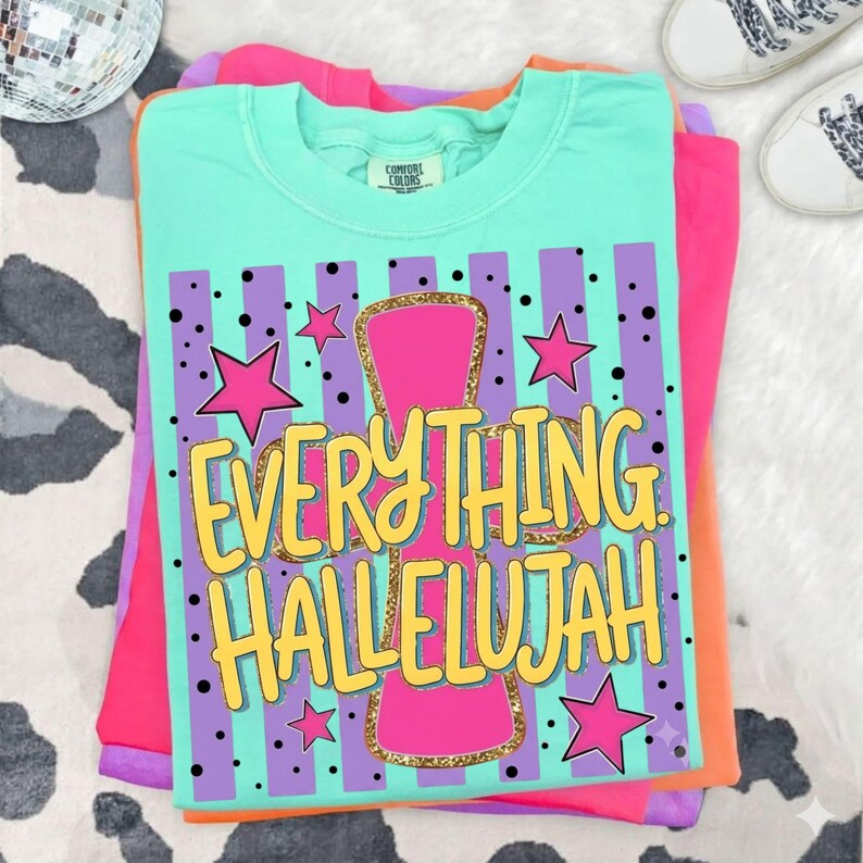 Everything Hallelujah PNG featuring a retro brushstroke design with colorful summer-inspired elements and Christian faith typography. Religious sublimation graphic with inspirational Jesus message, vintage aesthetic, mama-themed artwork, and uplifting catchphrase. Perfect for Christian shirts, faith-based apparel, tumblers, stickers, DIY crafts, print-on-demand products, and summer church events. High-quality digital download PNG with transparent background for sublimation and creative projects.