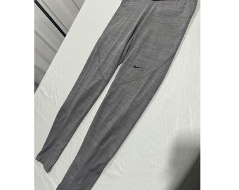 Legging de sport Nike Pro Dri-FIT gris chiné pour femme, petit modèle