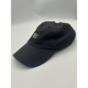 Gorra de golf ajustable Imperial Black Ripstop Performance con logo de corona
