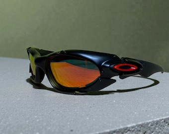 Oakley Plate-zonnebril Zwart montuur Rood Oranje Lens Y2K Cyber-futuristische sporttinten