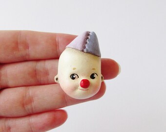 Cutie the Kewpie Clown - Paperclay Doll Face Pin