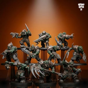 May include: A collection of miniature Orc figurines, each with green skin and detailed armor. The figures are posed in dynamic action stances, wielding weapons like swords, axes, and guns. The background is a gradient of orange and brown.