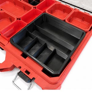 May include: A red plastic storage organizer case featuring multiple removable red bins and one large black insert with four internal compartments. The case includes a metal latch and a clear lid. Text on the image reads: NO TOOLS OR PACKOUT BOX INCLUDED.